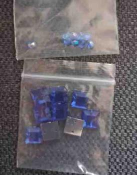 Set Perlen 9 x 4 mm olivfaccetierte und 9 x 10 x 10 mm blau
