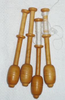 Set 4 bobbins 9 cm