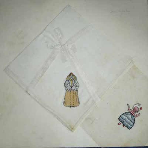 Three antique handkerchiefs with embroidery designs
