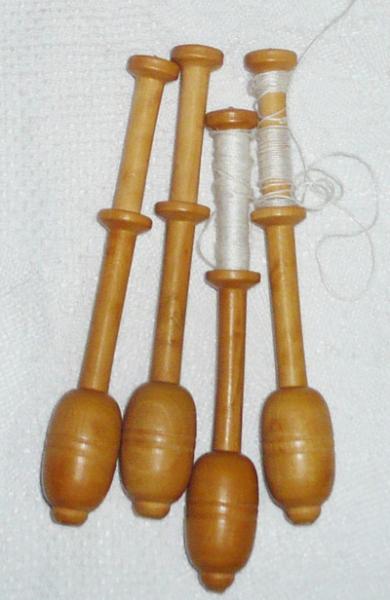 Set 4 bobbins 9 cm